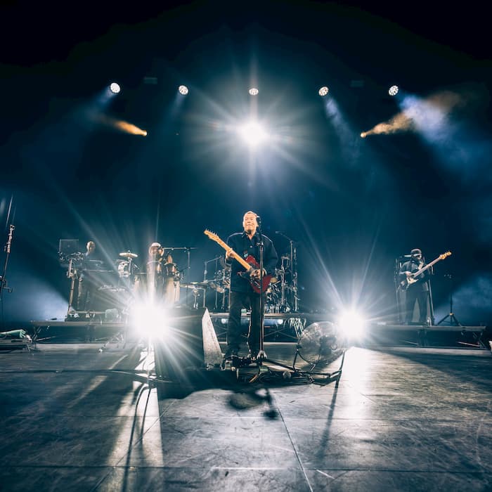 Surreal portrait of man with kaleidoscope effect and neon lighting